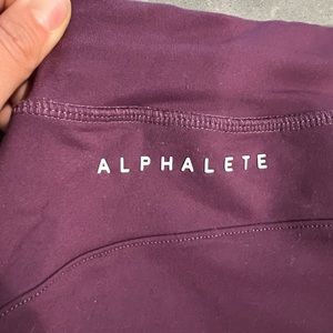 Pair of Maroon/Purple Women’s Alphalete joggers — size small